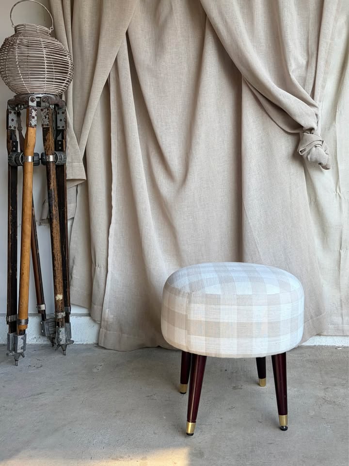 Checkered Round Ottoman with Tapered Wood Legs
